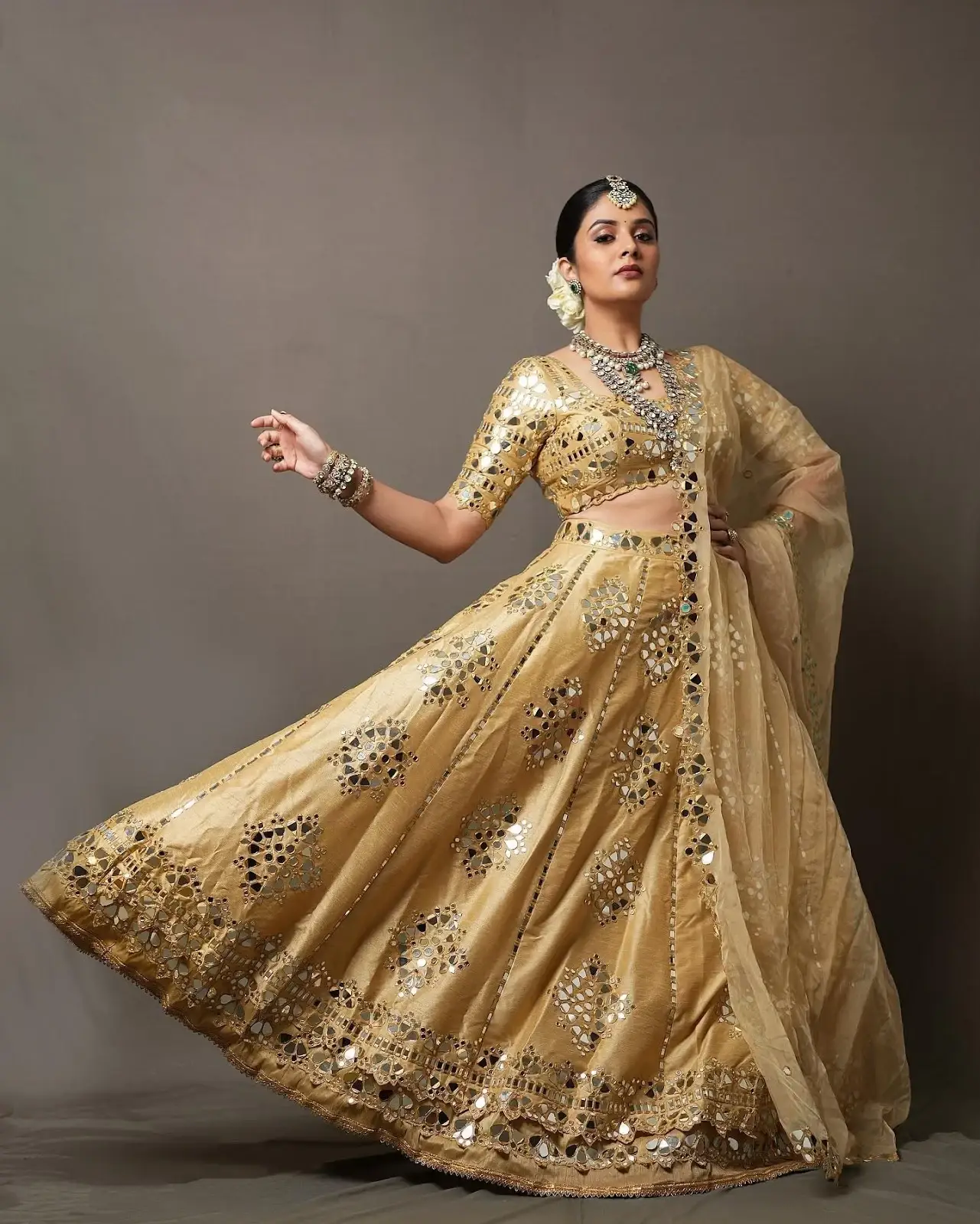 BEAUTIFUL TELUGU GIRL SREEMUKHI IN TRADITIONAL YELLOW LEHENGA CHOLI 8